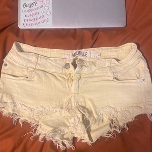 Brandy Melville yellow shorts size 38 slight rip in the back easily fixable